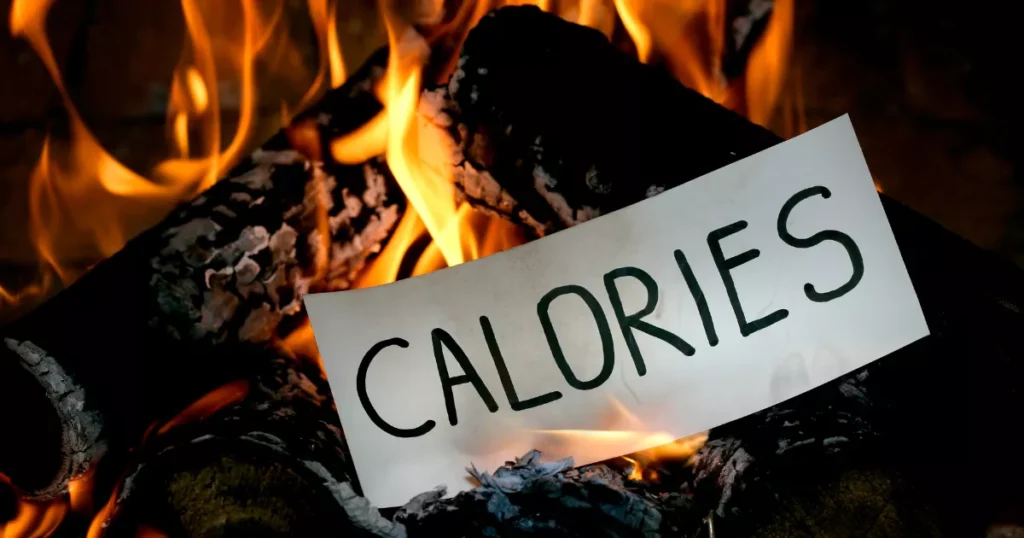 Calories written on paper with fire